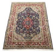Persian Saroug rug, blue ground with interlacing foliate design, central medallion decorated with st