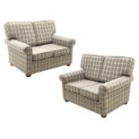 Peter Silk of Helmsley - Pair two seat settees upholstered in chequered fabric, on turned feet, W130