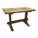 'Acornman' oak coffee table, rectangular adzed top on shaped end supports connected by pegged stretc