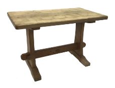 'Acornman' oak coffee table, rectangular adzed top on shaped end supports connected by pegged stretc