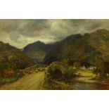 Owen Bowen (Staithes Group 1873-1967): Sheep crossing a Stone Bridge in the Lake District, oil on ca