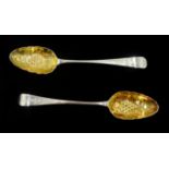 Pair of George III silver berry spoons with later embossed gilded bowls by Peter & Ann Bateman, Lond