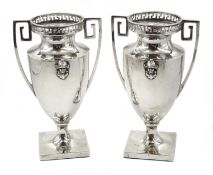 Pair of silver Neoclassical design urn shaped vases, with pierced key pattern top and handles by Cha