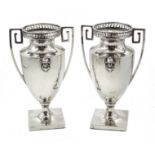 Pair of silver Neoclassical design urn shaped vases, with pierced key pattern top and handles by Cha