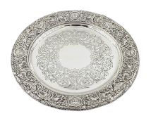 Victorian silver waiter in the Classical Revival style, the pierced border featuring a frieze of mas