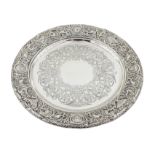 Victorian silver waiter in the Classical Revival style, the pierced border featuring a frieze of mas