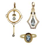 Edwardian gold blue topaz circular pendant stamped 9ct, one other gilt pendant and a 9ct gold oval b