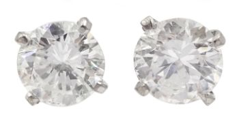 Pair of 18ct white gold round brilliant cut diamond stud earrings, total diamond weight approx 1.20