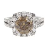 18ct white gold round brilliant cut fancy light brown diamond ring, with halo diamond surround and d