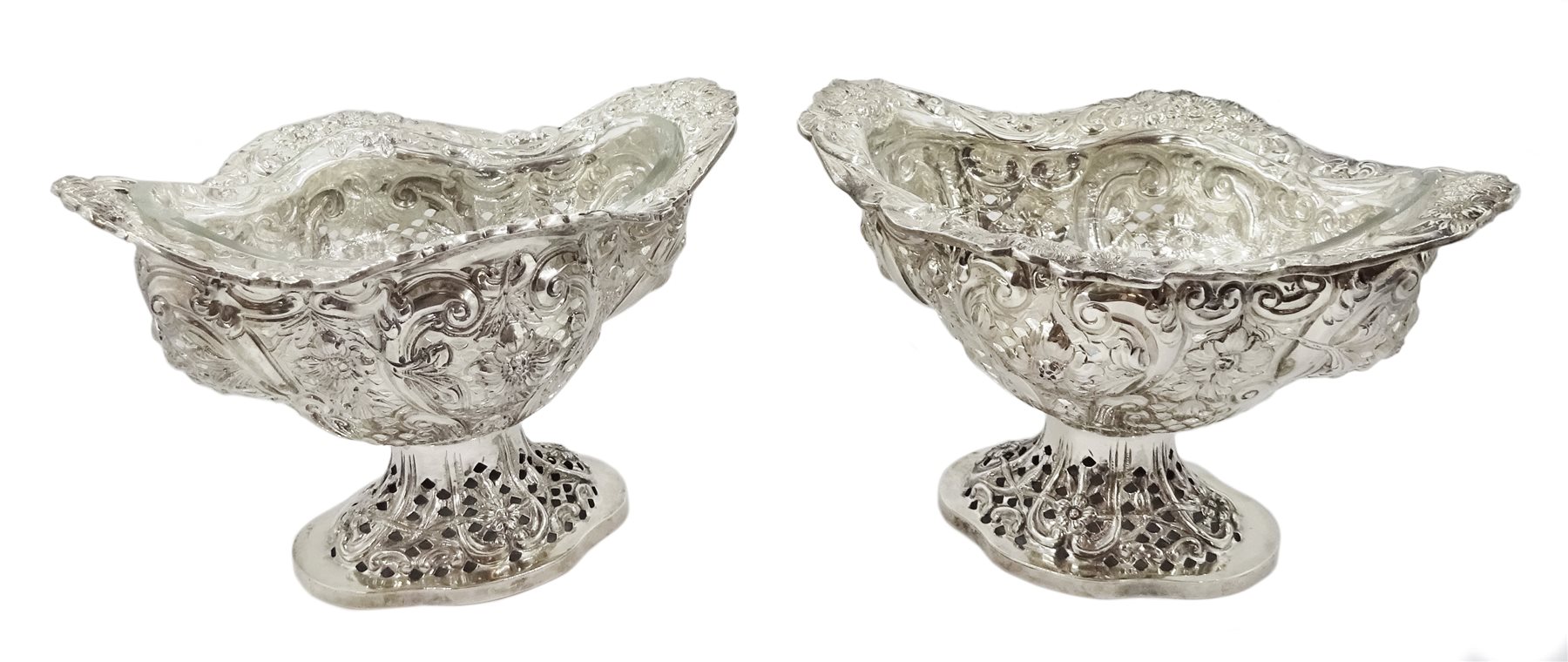 Four Victorian silver pedestal bon bon dishes, embossed foliate and pierced decoration, with glass l - Image 6 of 20