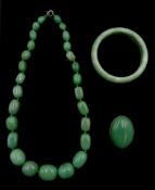 Jade bangle, necklace and brooch