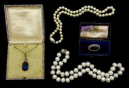 Two single strand pearl necklaces with silver clasps stamped 925, silver blue stone set necklace and