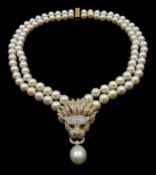 Akoya pearl and diamond lion's head necklace, double strand cultured pearls of approx 8mm, decorated