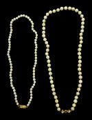 Two single strand cultured pearl necklaces, both with 9ct gold clasps,stamped or hallmarked