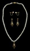Pair of 18ct gold screw back pearl earrings, stamped 750, 9ct gold pearl pendant necklace and match
