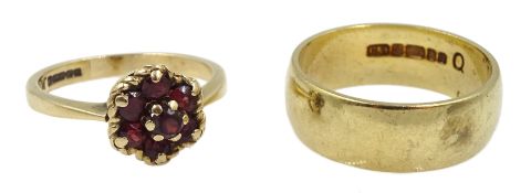 Gold wedding band and a gold garnet cluster ring, both hallmarked 9ct
