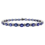 18ct white gold oval sapphire and diamond bracelet, stamped 750, total sapphire weight approx 12.00
