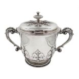 Edwardian Britannia silver twin handled lidded cup, in the late 17th Century style, with applied sty