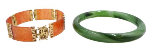 14ct gold orange jade bracelet hallmarked and a green jade bangle