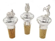 Silver bottle stoppers in the form of a rearing horse, a rabbit and an owl by L R Watson Birmingham