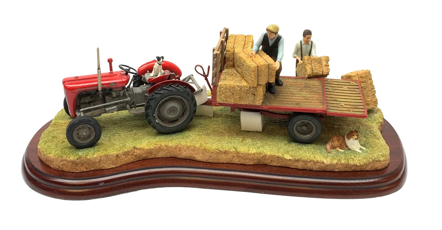 A Border Fine Arts figure group, Loading Up, model no A3448 by Ray Ayres, on wooden base, figure L32