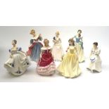 A group of seven Royal Doultan figurines, comprising of Take Me Home HN3662, Amy HN3316, Jean HN3757