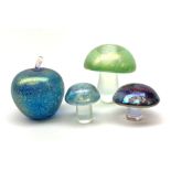 Three John Ditchfield Glasform iridescent mushroom paperweights, two with paper labels beneath, larg