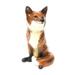 A Beswick fireside fox, model no 2348, with marks beneath, H31cm.