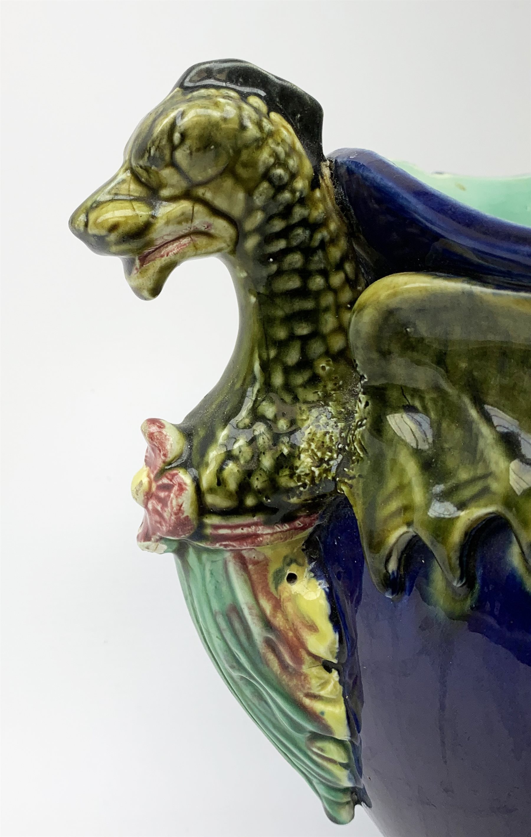 A 19th Century majolica blue ground jardini�re, with twin dragon handles, H26cm. - Image 2 of 2