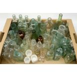 A collection of vintage glass lemonade and other glass bottles. (Qty).