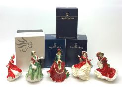 A group of five Royal Doulton figures, comprising Christmas Day 2000 HN4242, Christmas Day 2005 HN47