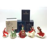 A group of five Royal Doulton figures, comprising Christmas Day 2000 HN4242, Christmas Day 2005 HN47