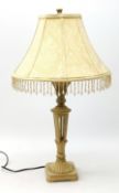 An antique style composite cream table lamp, with cream beaded shade, overall H67.5cm.