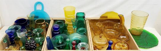 A large collection of glassware, comprising mostly amber glass, and some green and blue glass, to in