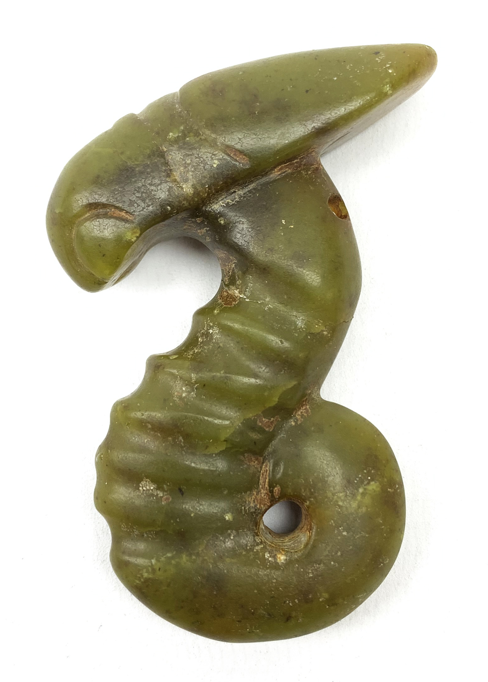 A Chinese carved jade pendant, modelled as a locust, H7cm.