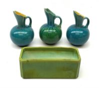 Three Linthorpe pottery jugs, two with turquoise ground, the other with merging turquoise and green,