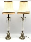 Pair of brushed brass and glass column table lamps with prism drops on circular stepped base, H67cm