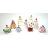 A group of Royal Doulton figurines, comprising of Sunday Best HN3218, Rebecca HN3414, Moonlight Rose