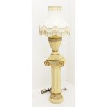 A composite cream Ionic column stand, H68cm, together with a matching table lamp of baluster form wi