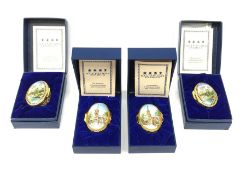 Four boxes Halcyon days enamel boxes, comprising two examples detailed with Durham Cathedral, and tw