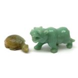 Two carved jade figures, the first modelled as a tiger, L10.5cm, the second as a turtle, L6.5cm.