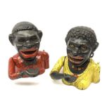 Two 20th century cast iron Jolly money banks, modelled as a male and female figure with mechanical a