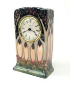 A Moorcroft mantle clock, decorated in the Cluny pattern designed by Sally Tuffin, with impressed an