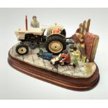 A Border Fine Arts figure group, Like Father Like Son, model no B0859 by Ray Ayres, on wooden base,