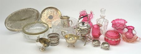 A selection of cranberry glass, comprising vase with frilled rim, three bowls, and two jugs, togethe