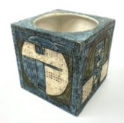 A Troika pottery cube vase or jardini�re, designed by Linda Taylor, the blue ground with geometric d