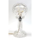 A clear cut glass table lamp, with domed glass shade, H35cm.