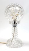 A clear cut glass table lamp, with domed glass shade, H35cm.