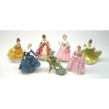 A group of seven Royal Doulton figurines, comprising Southern Belle HN2229, A Hostess of Williamsbur