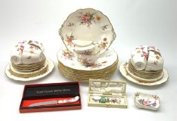 A selection of Royal Crown Derby Derby Posies pattern dinner and tea wares, comprising eight dinner